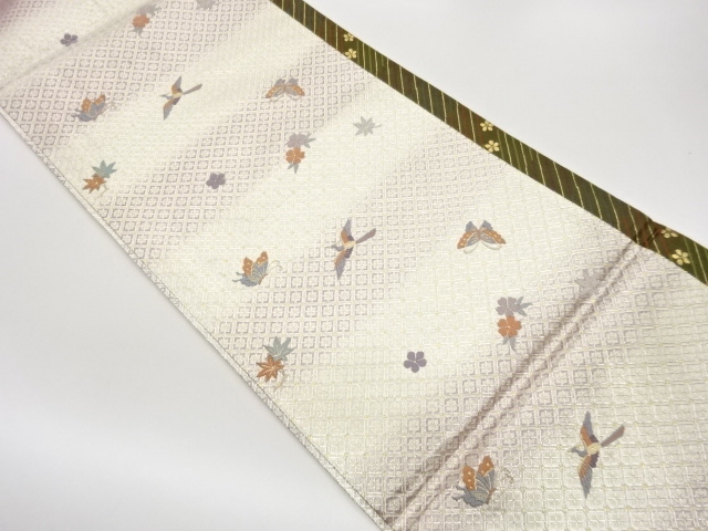 菱に蝶・紅葉・花鳥模様織出し全通袋帯